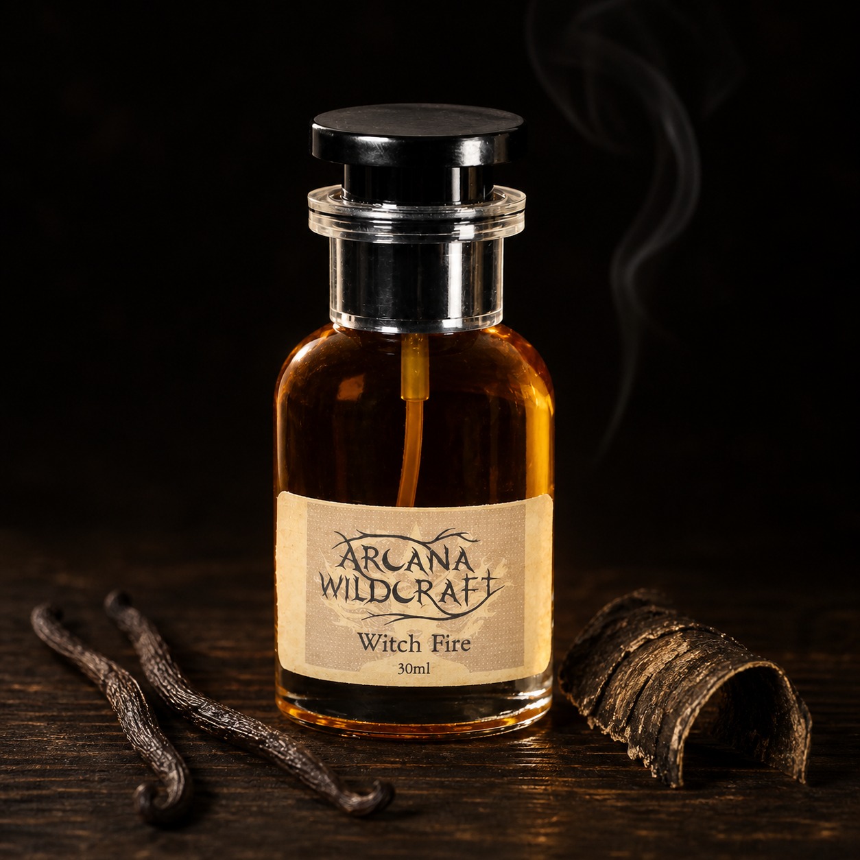Arcana Wildcraft Witch Fire perfume bottle beside vanilla bean pods and birch bark